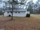 Ranch home with storage shed and large backyard at 553 Highway 279, Fayetteville, GA 30214
