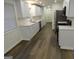 Modern kitchen with white cabinets and stainless steel appliances at 553 Highway 279, Fayetteville, GA 30214