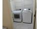 Laundry room with washer and dryer in a closet at 553 Highway 279, Fayetteville, GA 30214