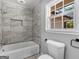 Clean bathroom, updated tile shower and tub at 215 Elliott Rd, Mcdonough, GA 30252