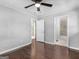 Bedroom with hardwood floors, access to bathroom at 215 Elliott Rd, Mcdonough, GA 30252