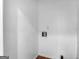 Small laundry area with hookups for washer and dryer at 215 Elliott Rd, Mcdonough, GA 30252