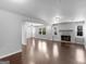 Spacious living room with hardwood floors and fireplace at 215 Elliott Rd, Mcdonough, GA 30252