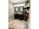Bathroom featuring a dual vanity, modern lighting, and open shelving at 144 Cottsford Sw Dr # 22, South Fulton, GA 30331
