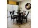 Formal dining room featuring a round table, chairs, and updated fixtures at 144 Cottsford Sw Dr # 22, South Fulton, GA 30331