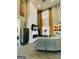 Contemporary living room with a tall fireplace, stylish furniture, and ample light at 144 Cottsford Sw Dr # 22, South Fulton, GA 30331
