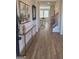 Inviting foyer with wood floors, decor table, and stylish staircase at 376 Collier Mills Road, Lawrenceville, GA 30045