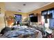 Bedroom with double bed, TV, and desk at 1826 E Farris Ave, East Point, GA 30344