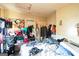 Bedroom with double bed, and clothes strewn about at 1826 E Farris Ave, East Point, GA 30344