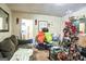 Living room with sofa and Christmas tree at 1826 E Farris Ave, East Point, GA 30344