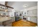 Modern kitchen with stainless steel appliances and granite countertops at 1575 Little Lisa Ln, Snellville, GA 30078