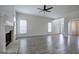 Large living room featuring fireplace, hardwood floors, and natural light at 233 Yorkshire Ln, Villa Rica, GA 30180