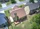 Aerial shot of the backyard with lush greenery and a wooden deck attached to the house at 233 Yorkshire Ln, Villa Rica, GA 30180