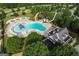 Aerial view of the community pool features a slide, water play area, and ample seating at 233 Yorkshire Ln, Villa Rica, GA 30180