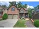 Charming two-story brick home with a two-car garage and inviting front porch at 233 Yorkshire Ln, Villa Rica, GA 30180