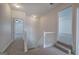 Upstairs landing featuring plush carpet and access to multiple rooms at 233 Yorkshire Ln, Villa Rica, GA 30180