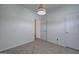 Neutral bedroom featuring soft carpet and a contemporary light fixture at 233 Yorkshire Ln, Villa Rica, GA 30180