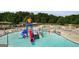 Community water park offers a splash bucket and various slides for and adults at 233 Yorkshire Ln, Villa Rica, GA 30180