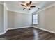 Bright bedroom with hardwood floors and a ceiling fan at 301 Cochin Dr, Woodstock, GA 30188