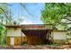 Large deck overlooks private wooded backyard at 1139 Pine Mountain Dr, Forest Park, GA 30297