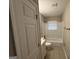 Clean bathroom with white vanity and tiled tub/shower at 1139 Pine Mountain Dr, Forest Park, GA 30297