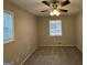 Bright bedroom with ceiling fan and neutral carpet at 1139 Pine Mountain Dr, Forest Park, GA 30297
