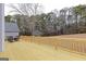 Wooden deck overlooking a large backyard with plenty of trees at 167 Sun Rd, Fayetteville, GA 30214