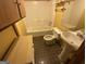 Bathroom with shower/tub combo and pedestal sink at 519 Rock Quarry Rd, Austell, GA 30106