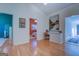 Bright hallway with hardwood floors and built-in desk at 5117 Indie Se Cir, Covington, GA 30014