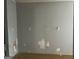 View of the wall in bedroom with peeling paint at 4692 College St, Forest Park, GA 30297