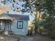 Charming single-story home featuring classic windows and a compact deck in the backyard at 4692 College St, Forest Park, GA 30297