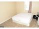 Bedroom showing neutral walls and a window allowing natural light at 3013 Pommel Ct, Conyers, GA 30013