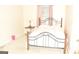 Bedroom showcases a metal bed frame and neutral colored walls at 3013 Pommel Ct, Conyers, GA 30013