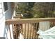 Wood deck with a natural view surrounded by trees and foliage at 3013 Pommel Ct, Conyers, GA 30013
