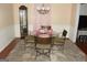 Dining room featuring a glass table set and decorative chandelier at 3013 Pommel Ct, Conyers, GA 30013