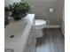 Clean, well-maintained bathroom with updated fixtures and finishes, plus luxury vinyl plank flooring at 139 Cecelia Cir, Jonesboro, GA 30236