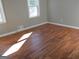 Sunny bedroom with refinished hardwood flooring and natural light at 139 Cecelia Cir, Jonesboro, GA 30236