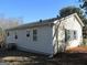 Rear view of house showing additional windows and yard at 139 Cecelia Cir, Jonesboro, GA 30236