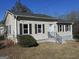 Ranch style home with gray trim and landscaping at 139 Cecelia Cir, Jonesboro, GA 30236