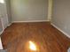 Inviting living room showcasing gleaming hardwood floors and neutral paint, creating a warm atmosphere at 139 Cecelia Cir, Jonesboro, GA 30236