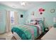 Charming bedroom with mint walls, polka dot curtains and bedding at 118 Michael Ct, Dallas, GA 30157