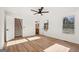 Spacious bedroom with wood floors and a view of the stairs at 3939 Hamilton Mill Rd, Buford, GA 30519