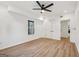 Spacious bedroom with modern ceiling fan, a window and a large double-door closet at 3939 Hamilton Mill Rd, Buford, GA 30519