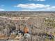 Aerial view showcasing a home nestled among trees in a private, scenic location at 3939 Hamilton Mill Rd, Buford, GA 30519