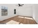 Large bedroom with hardwood floors and natural light at 3939 Hamilton Mill Rd, Buford, GA 30519