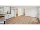 Open-concept living area featuring new floors, neutral paint and light wood countertops at 3939 Hamilton Mill Rd, Buford, GA 30519
