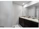 Bright bathroom features dual sinks and granite countertops at 151 Brasch Park Dr, Grantville, GA 30220