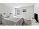 Comfortable bedroom with neutral colors, carpet flooring and a window at 151 Brasch Park Dr, Grantville, GA 30220