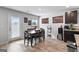 Dining room area with a large table, chairs, and a door providing natural light at 151 Brasch Park Dr, Grantville, GA 30220