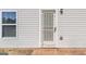 This is an exterior image that focuses on the door and window of a home at 151 Brasch Park Dr, Grantville, GA 30220